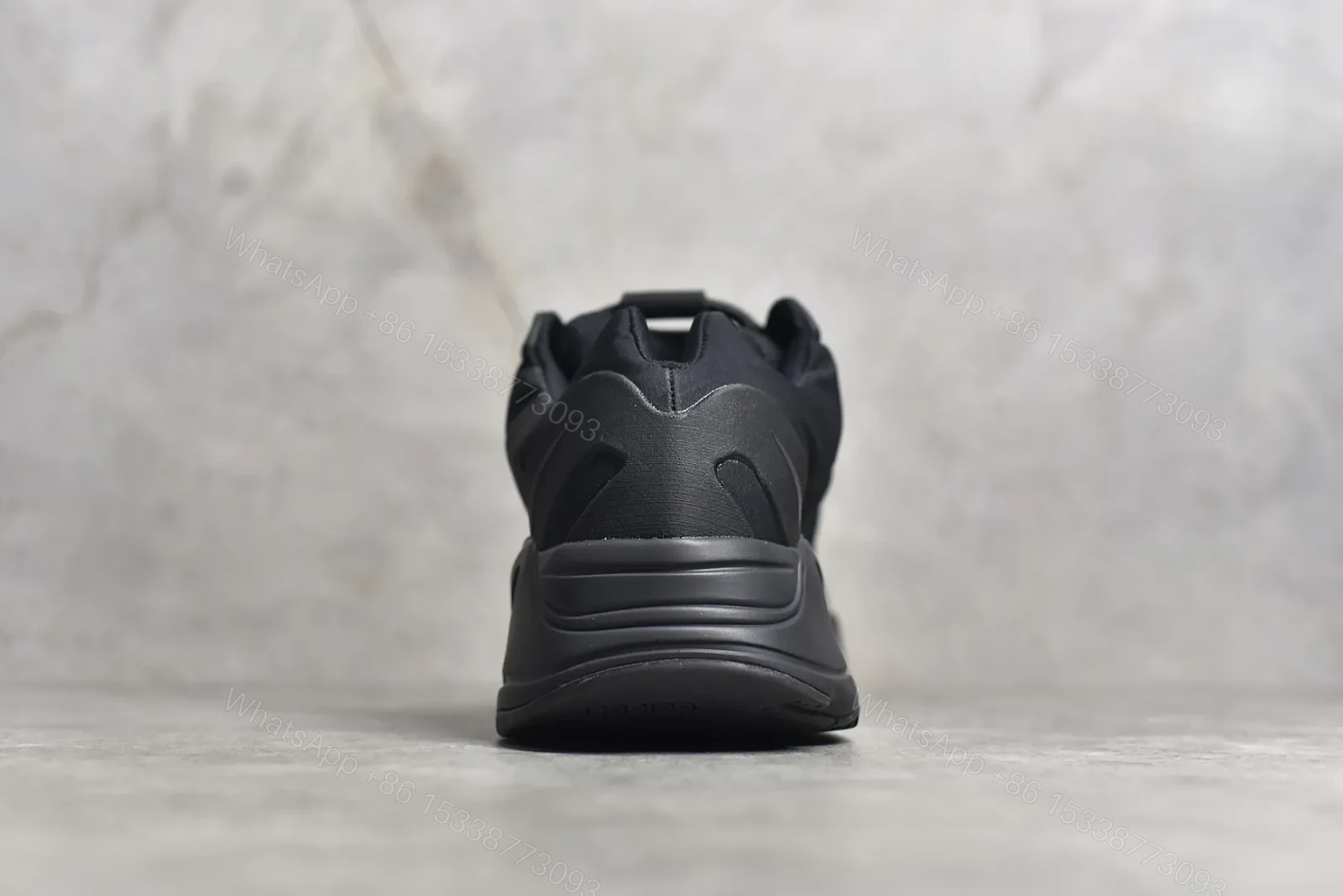 View 7 of Adidas Yeezy Boost 700 MNVN “Triple Black” Reps