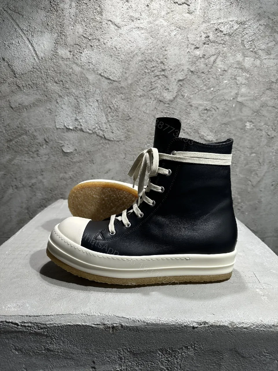 View 4 of Black Leather High-Top Sneakers with Off-White Accents