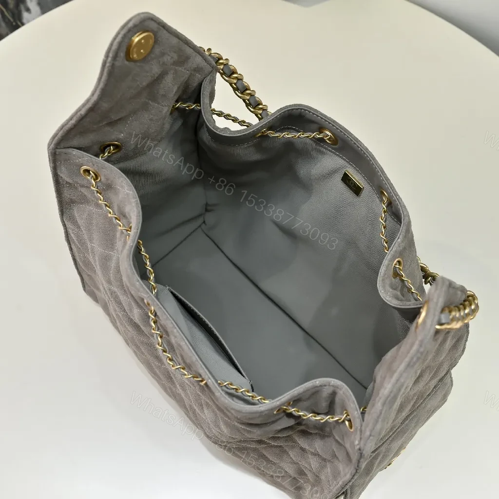 View 2 of Gray Quilted Bucket Bag with Gold Chain – Modern Texture, Everyday Versatility
