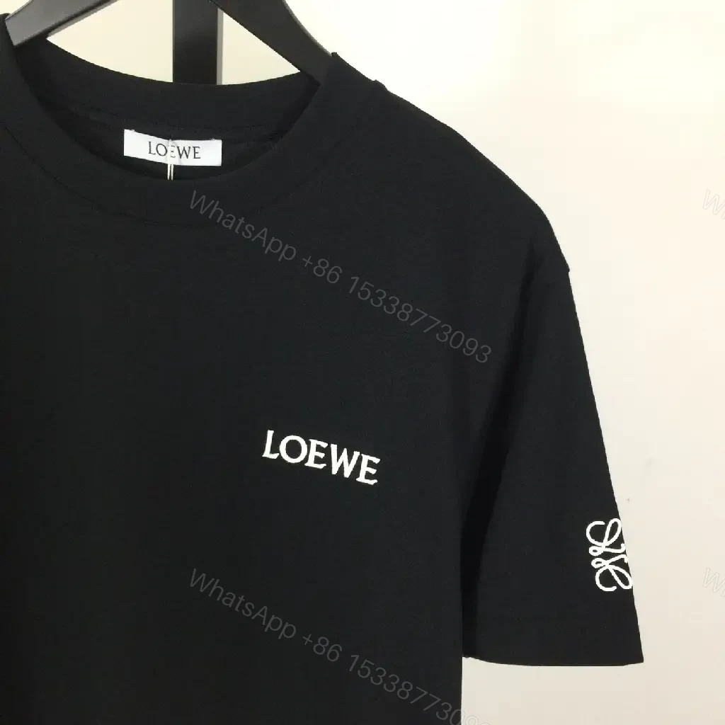 View 4 of Minimalist Black Tee: Subtle Branding, Everyday Luxury Tee