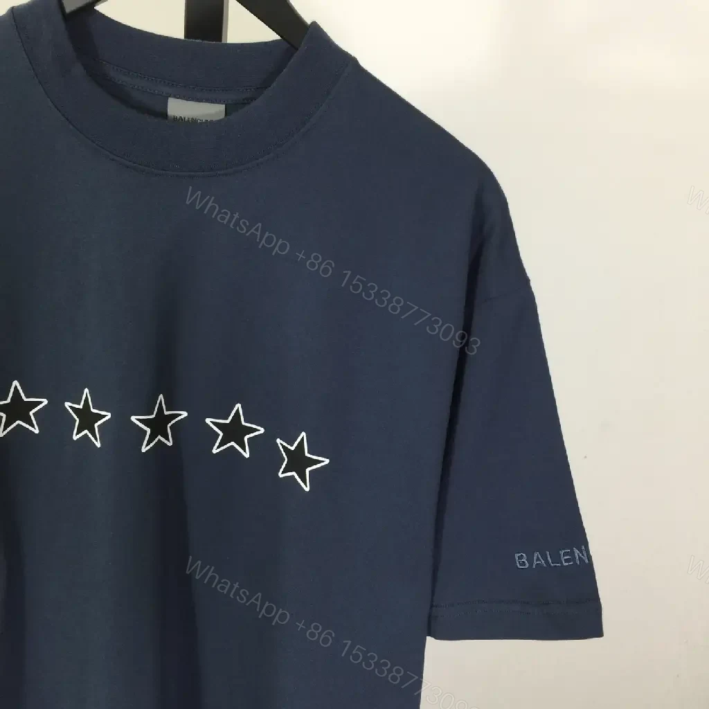 View 8 of Minimalist Star Tee: Luxe Comfort, Subtle Branding, Navy