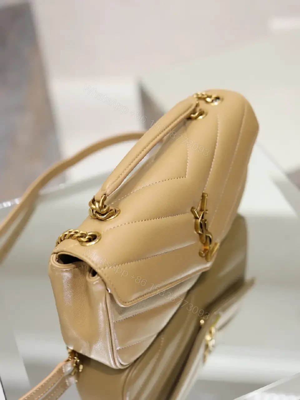 View 7 of Beige Leather Structured Top-Handle Flap Bag with YSL Logo
