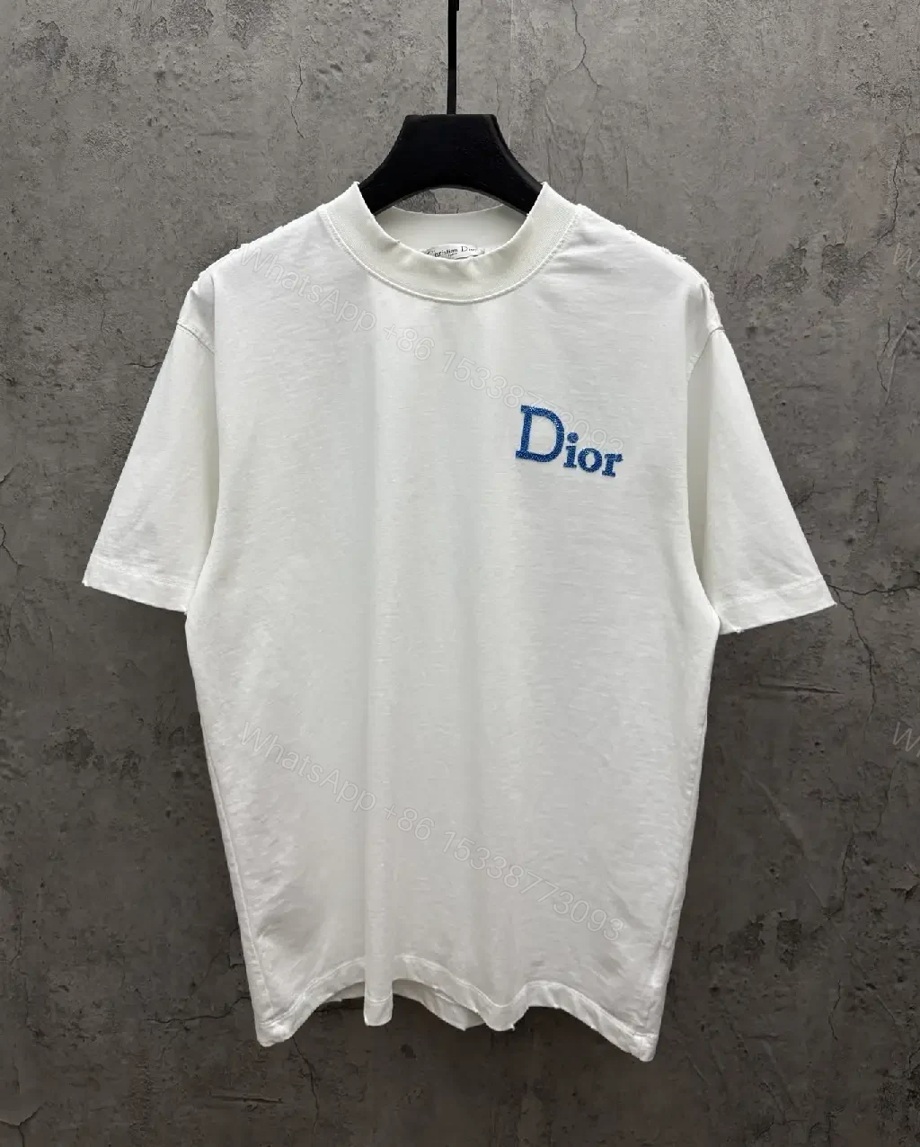 View 5 of Minimalist White Tee with Blue Embroidered Logo, Premium Cotton