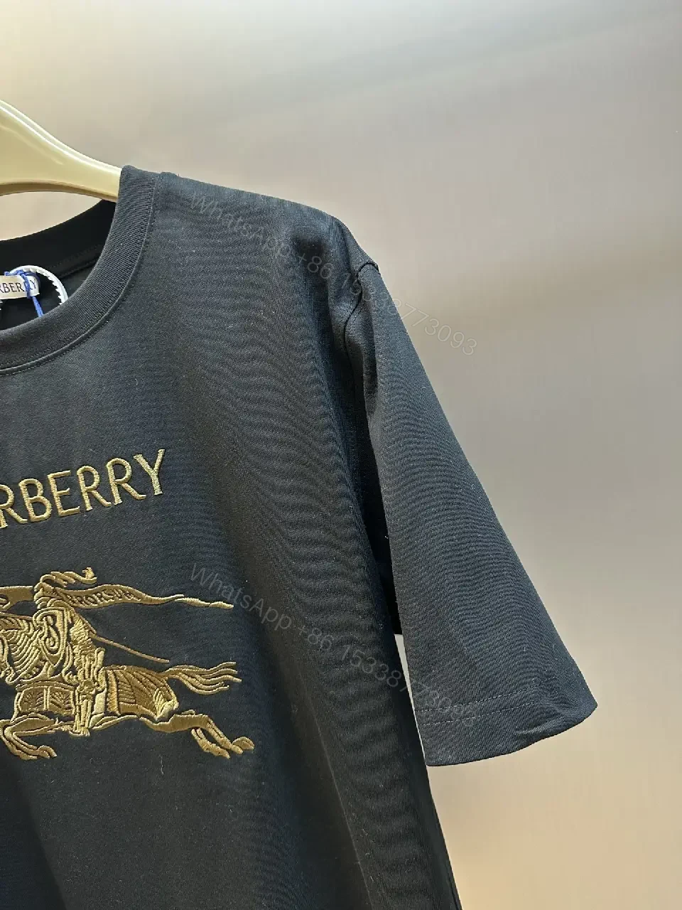 View 2 of Oversized Black Tee with Crest – Premium Cotton, Luxe Casual Tee