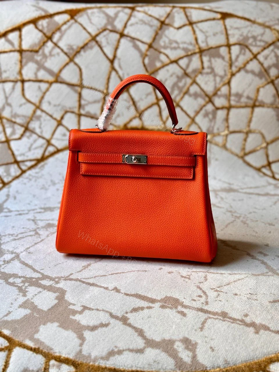 HERMÈS Kelly 25 handbag in Chai Togo — view 1