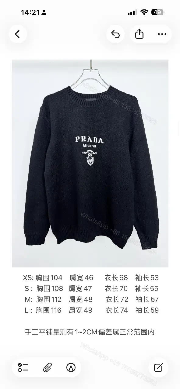 View 2 of Black Knit Pullover with Crest – Elevated Comfort Knitwear