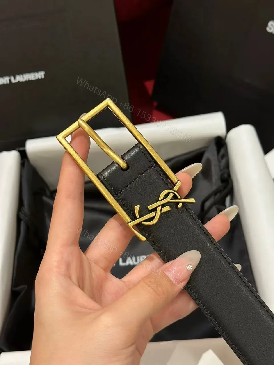 View 3 of Sleek Black Leather Belt with Gold Buckle Detail