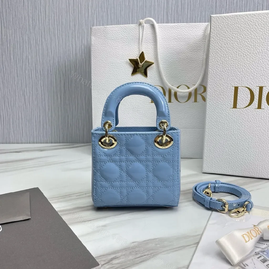 View 3 of Blue Quilted Mini Bag - Calf Leather, Crossbody/Top Handle, Magnetic Closure