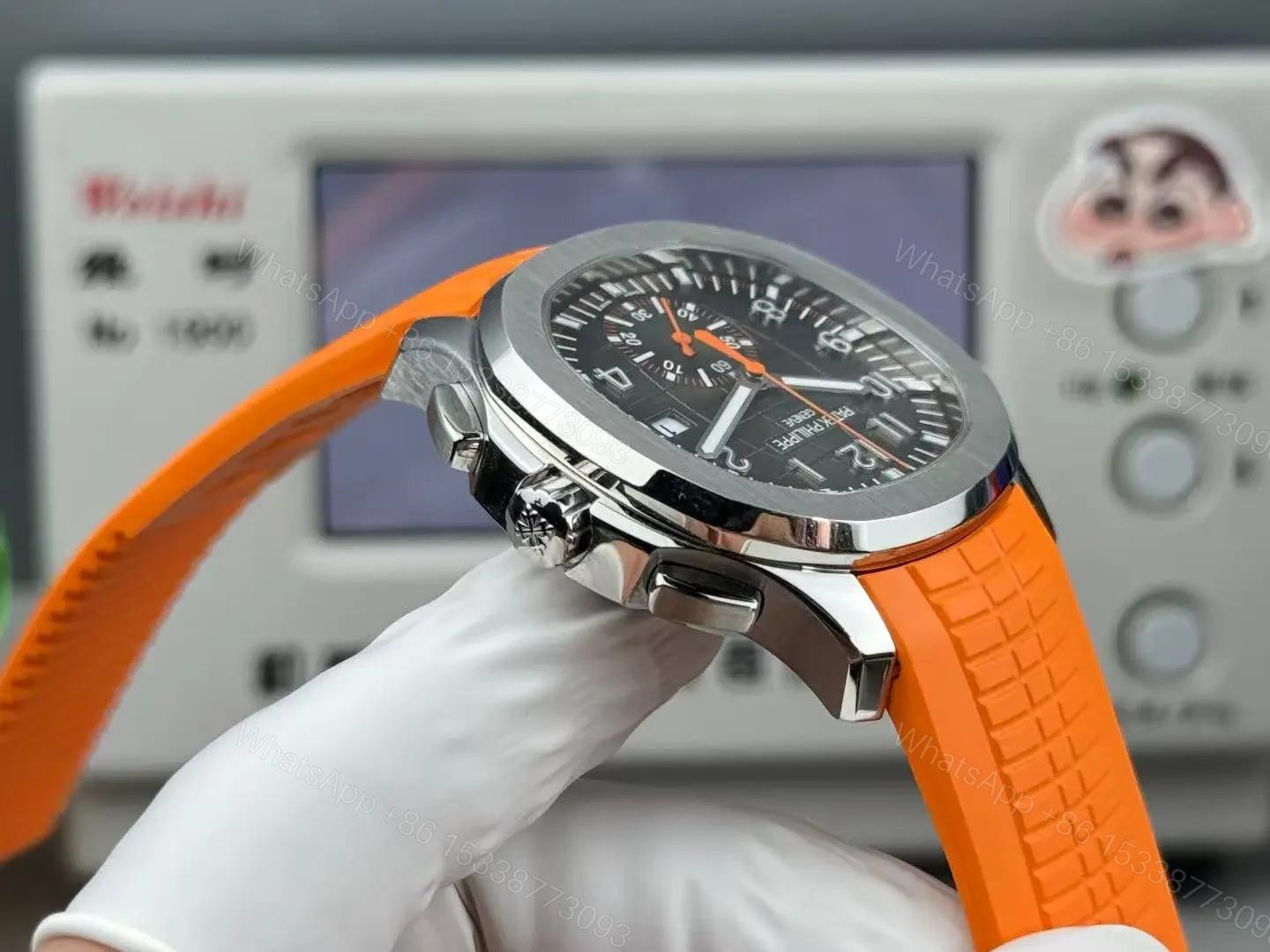 View 6 of Patek Philippe super clone Aquanaut Black Dial Orange Rubber Strap Premium 42MM PATEK-AQUA42-BLK-ORG