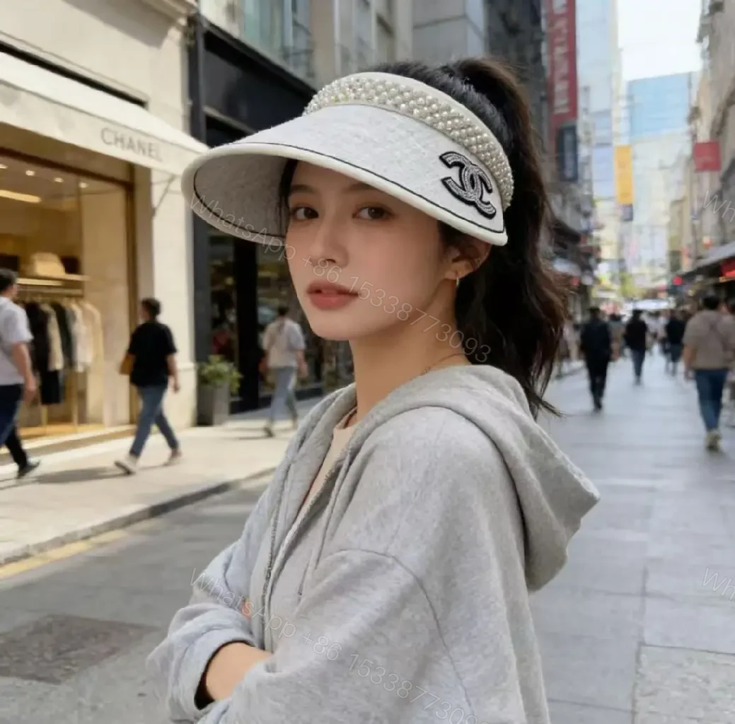 View 10 of Light Gray Linen Visor Cap with Rhinestone Collar and Chanel Logo