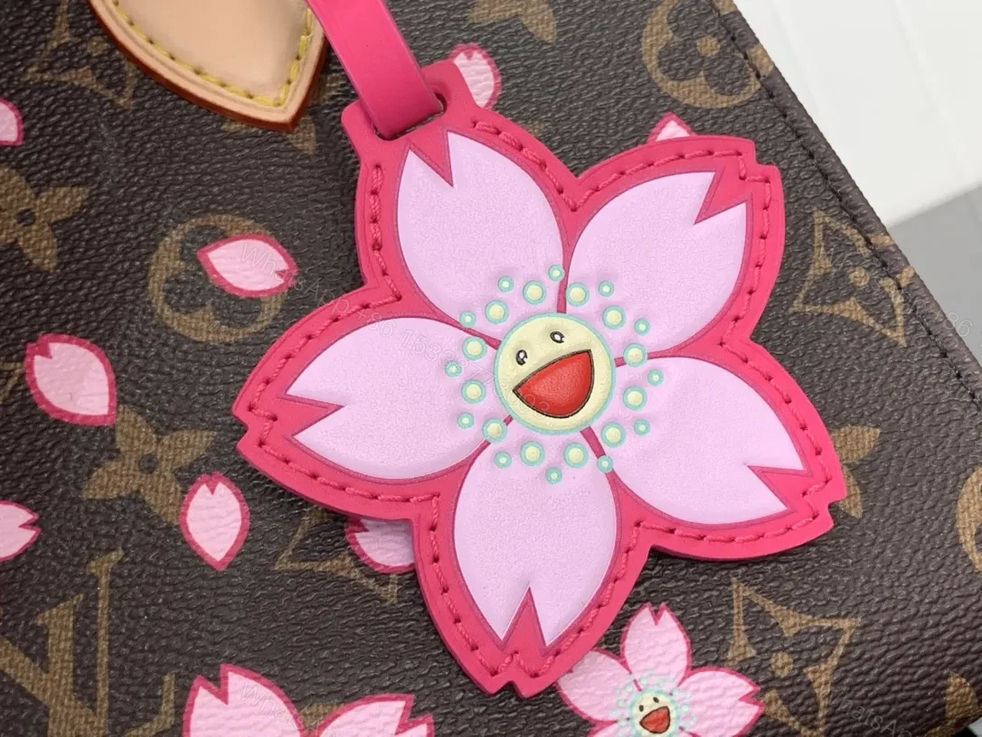 View 2 of Bold Blossom Messenger: Floral Luxury Handbag, Monogrammed Canvas