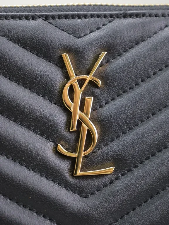 View 7 of Chic Chevron Quilted Clutch with Gold Emblem - Compact Luxury