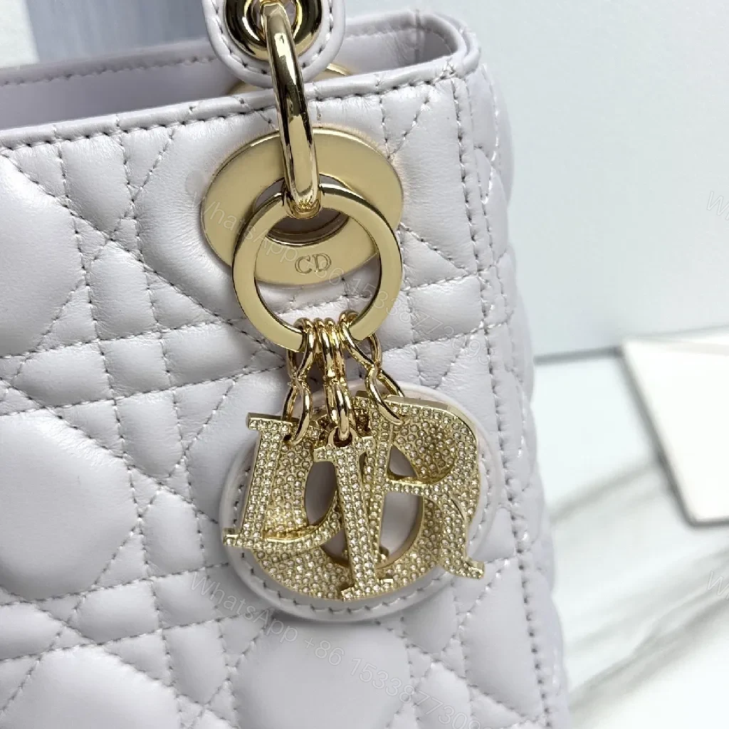 View 7 of Quilted Gold-Accent Mini Bag: Day-to-Night Luxury