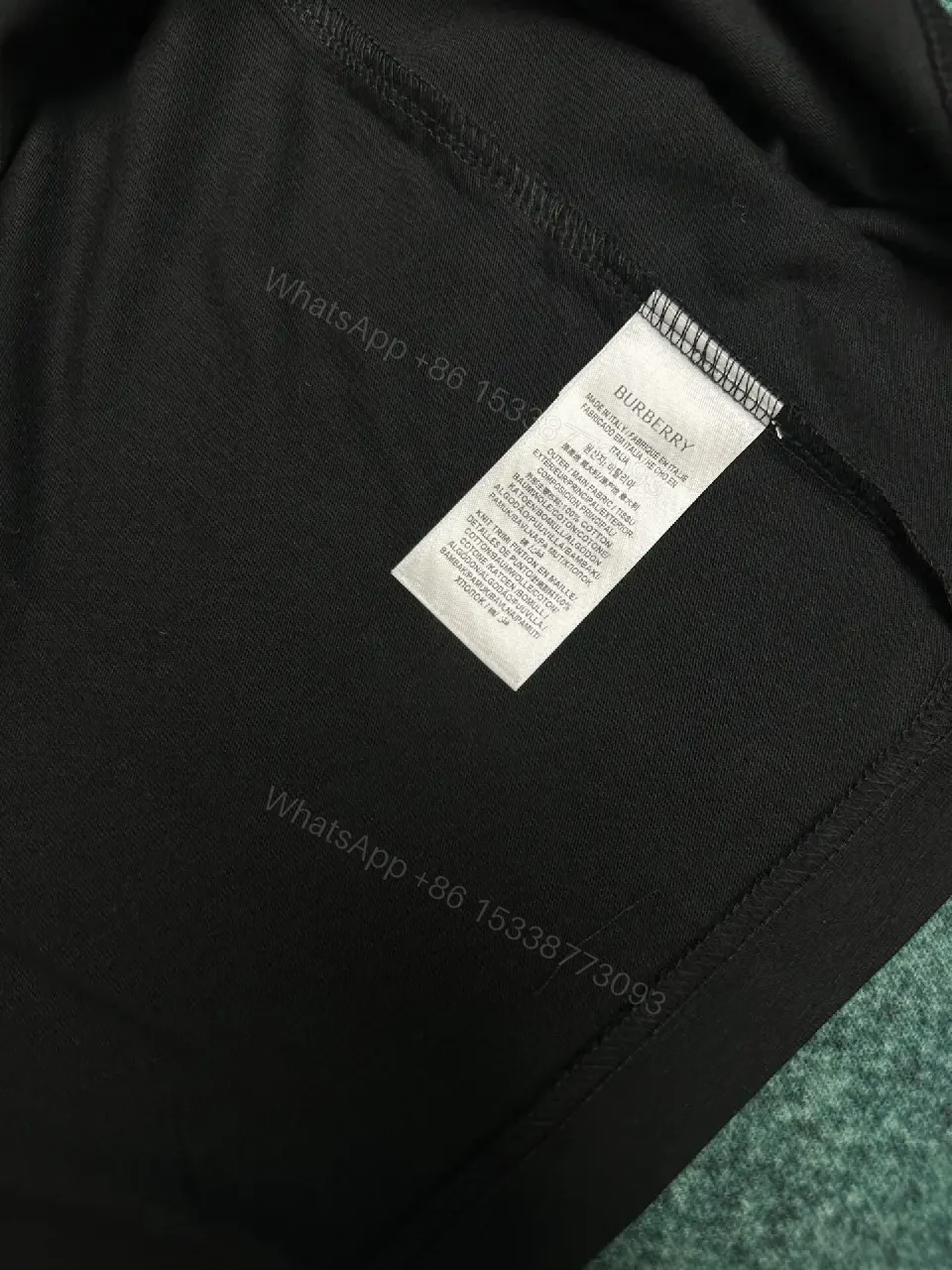 View 4 of Minimalist Black Tee: Crest-Inspired, Elevated Comfort Tee