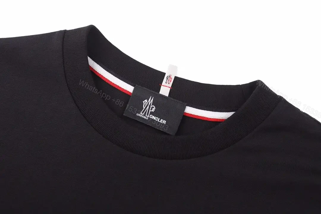 View 2 of Black Cotton Relaxed Fit Tee with Chest Text Graphic and Emblem - T-Shirt