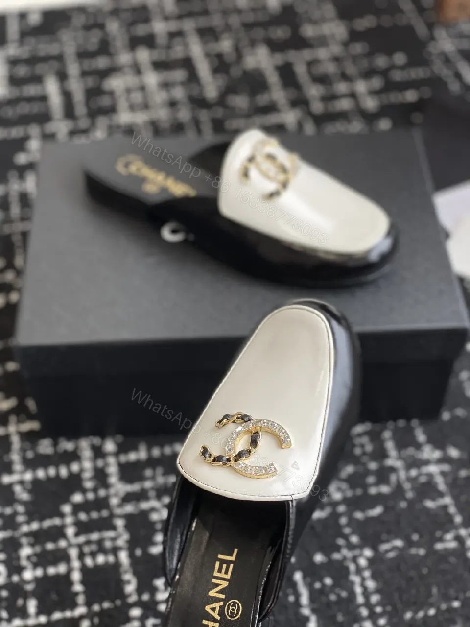View 2 of Ivory-Black Leather Mules: Gold-C Logo Slip-Ons