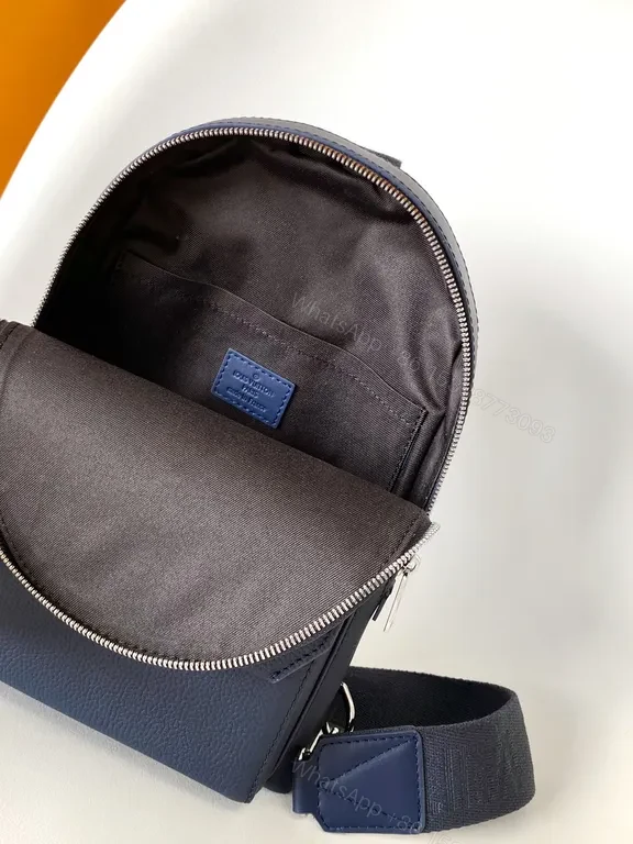 View 5 of Chic Blue Leather Compact Backpack with LV Detail