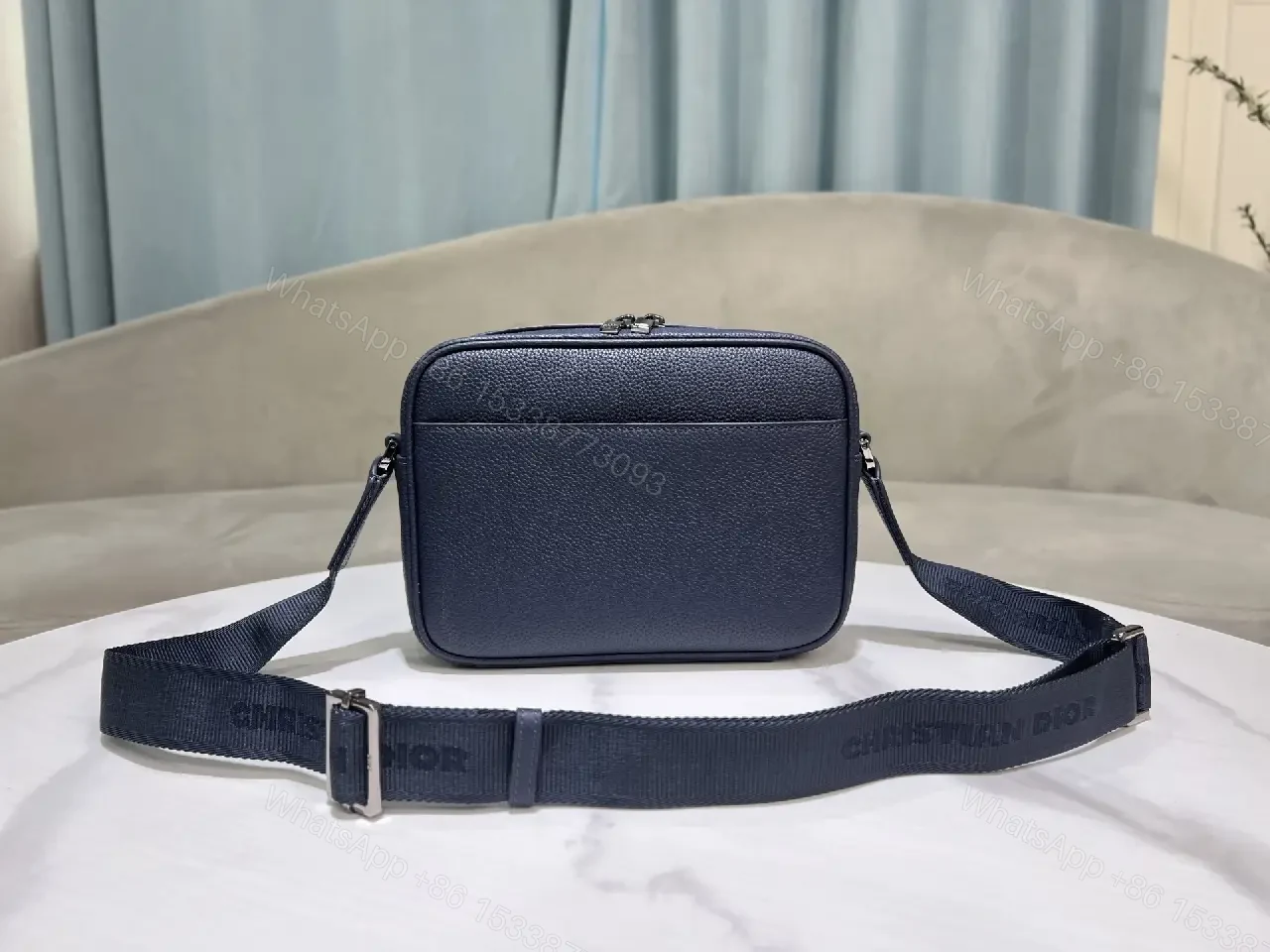 View 8 of Blue Leather Crossbody: Compact Luxury with Playful Edge