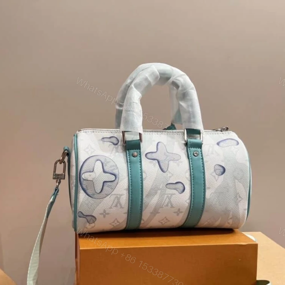 View 4 of Louis Vuitton Keepall Bandouliere Crystal Green 25Cm M22527