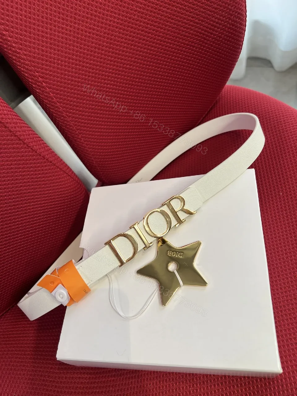 View 2 of Minimalist White Strap Belt with Gold DIOR Lettering
