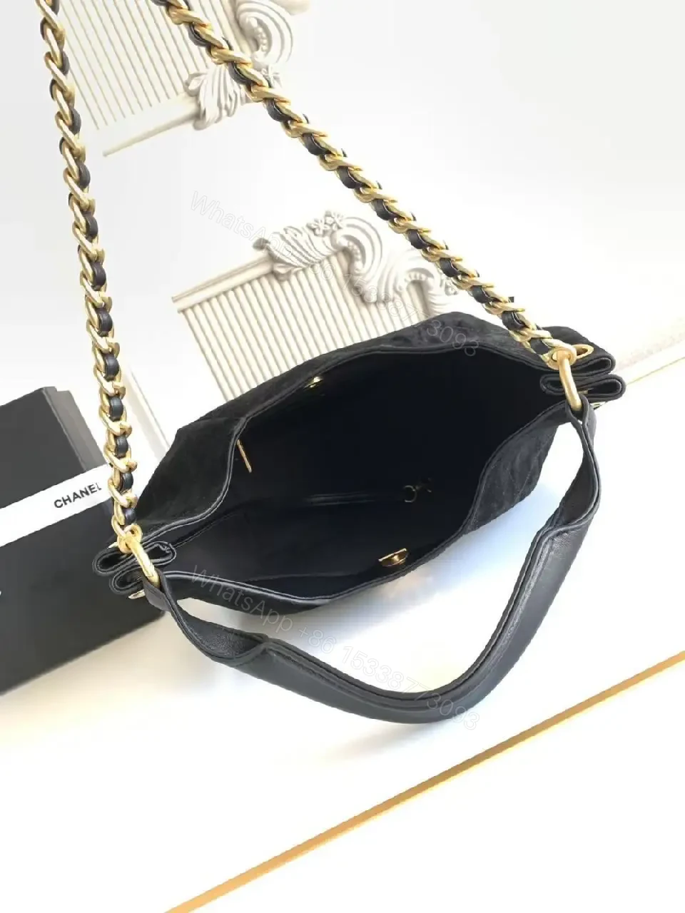 View 10 of Chic Black Quilted Bag with Gold Chain: Everyday Luxury