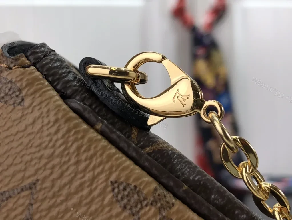 View 4 of Gold-Coated LV Monogram Crossbody Bag - Compact Luxury