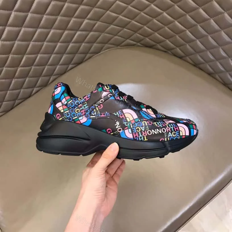 View 2 of Gucci x The North Face Rhyton Low Top Sneakers In Black – GC126
