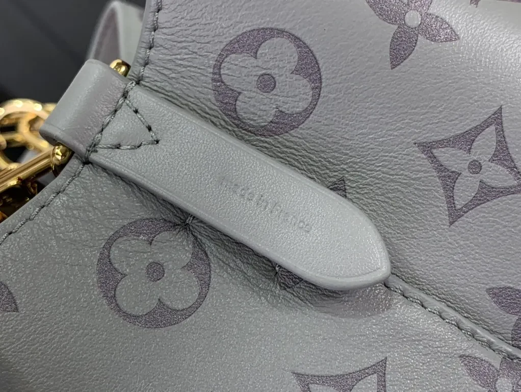View 8 of Chic Monogram Bucket Bag: Gray Leather, Chain Accent, Versatile Luxury