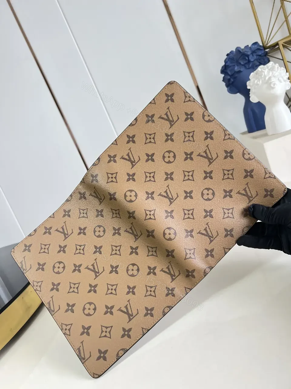 View 3 of Brown Monogram Canvas Bifold Wallet with LV Pattern, Vertical Zipless Style