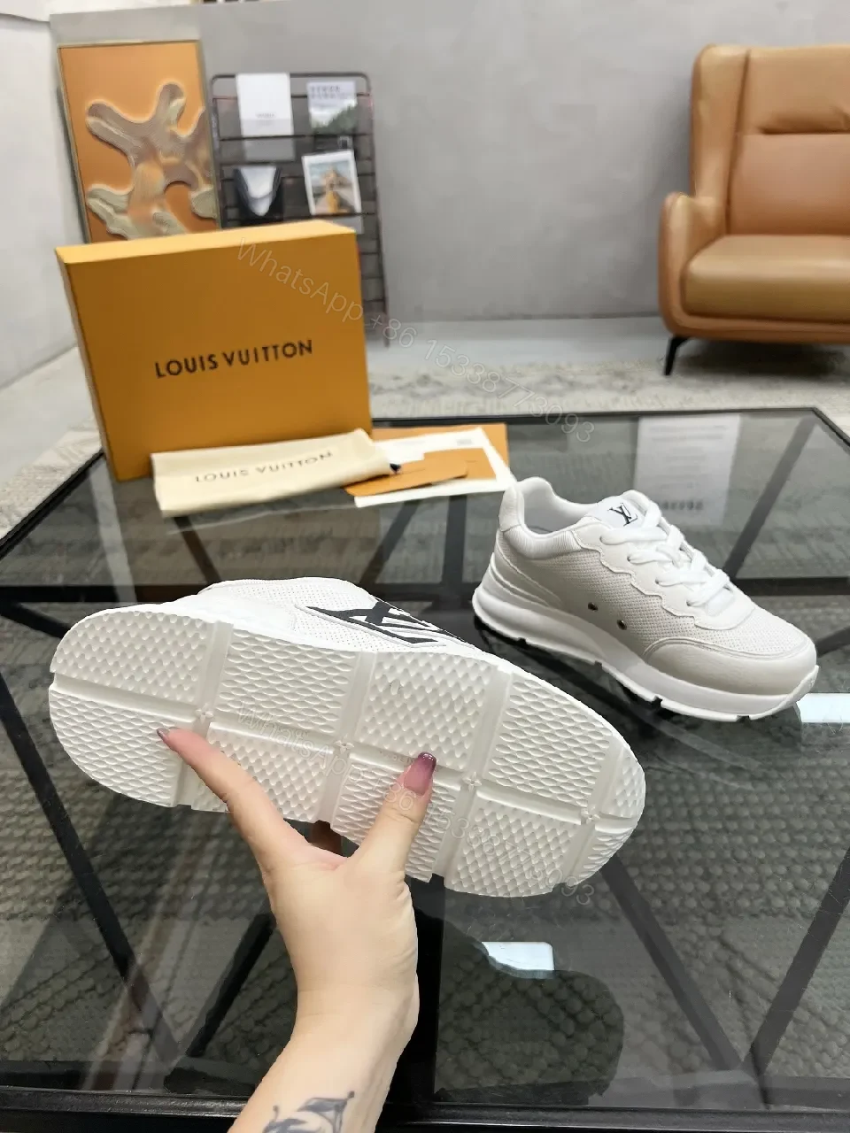 View 4 of White Leather Low-Top Luxury Sneakers with Subtle Logo Detail