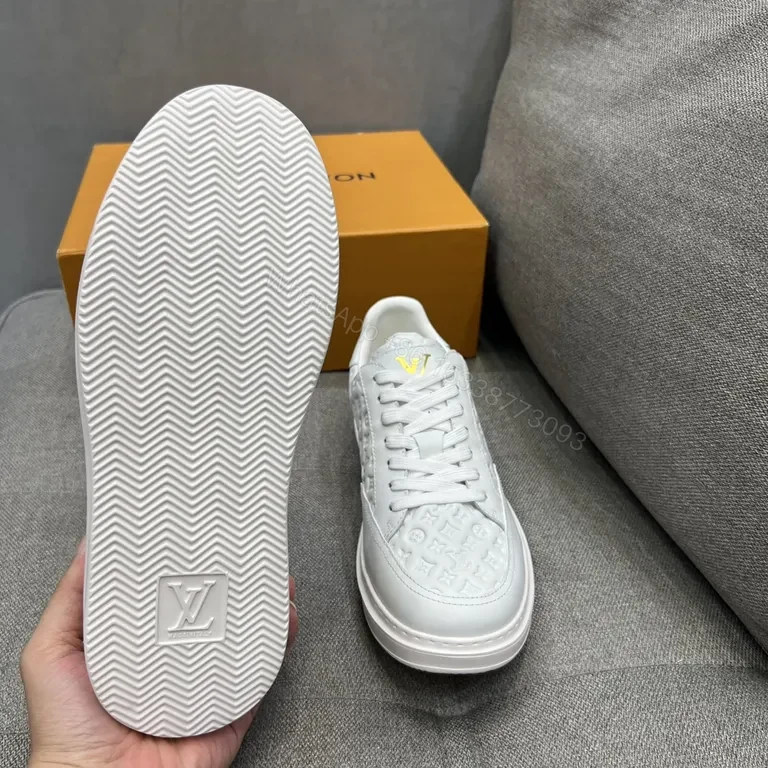 View 8 of White Leather Sneakers with Gold LV Accent, Luxe Everyday