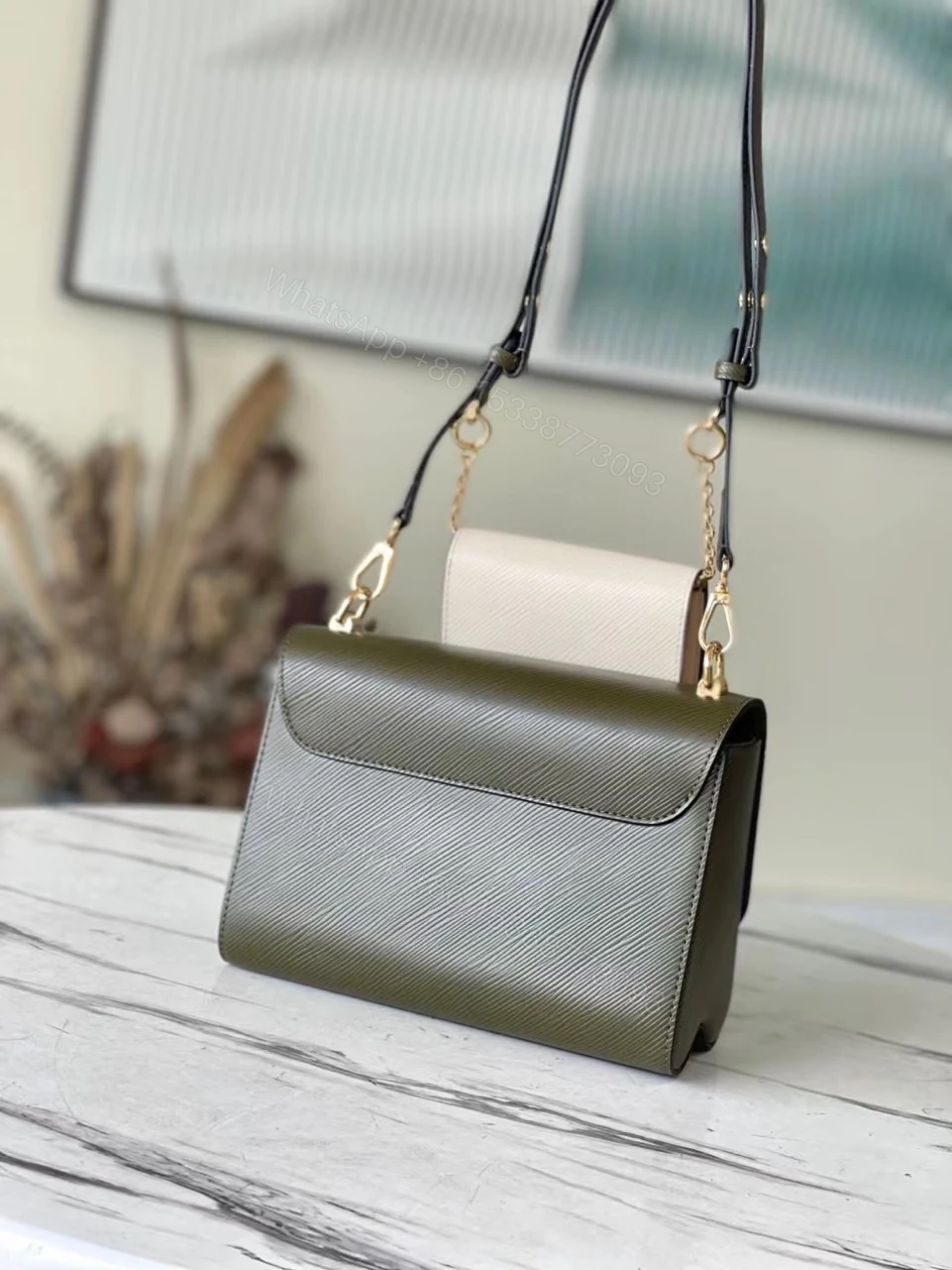 View 2 of Louis Vuitton LV Twist Replica Cowhide Leather Handbags Woman’s 24cm