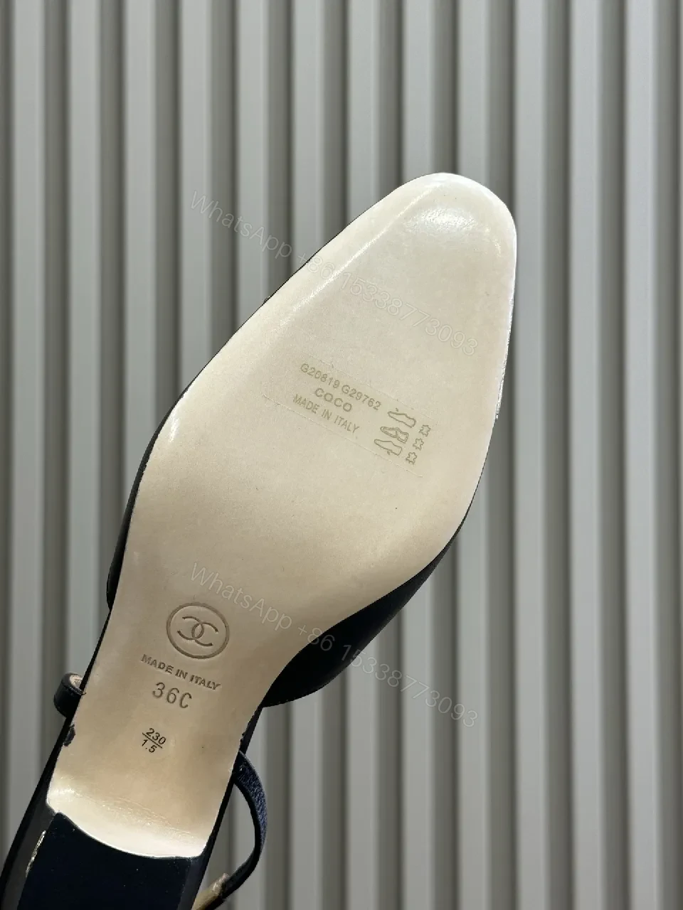 View 7 of Elegant Slingback Pumps: Black Leather with Metallic Cap Toe