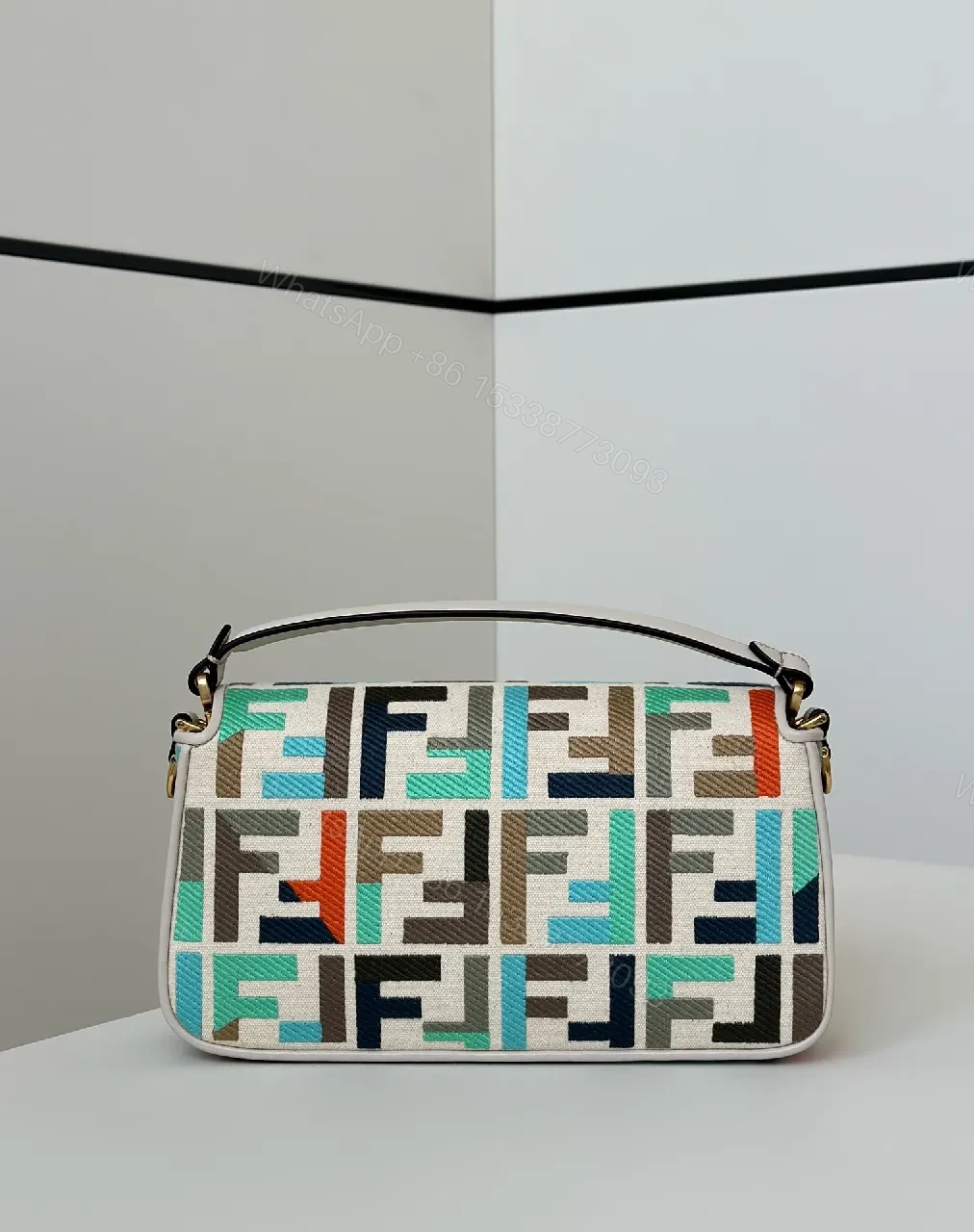 View 2 of Geometric Pattern Bag with Bold Gold Hardware Crossbody