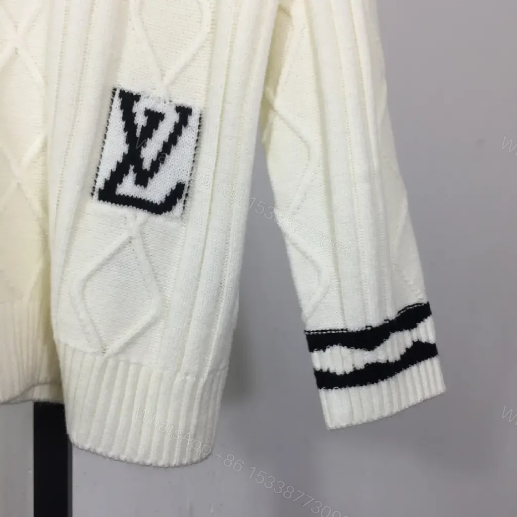 View 5 of Creamy Off-White Cable-Knit Crewneck Sweater with Striped Cuffs