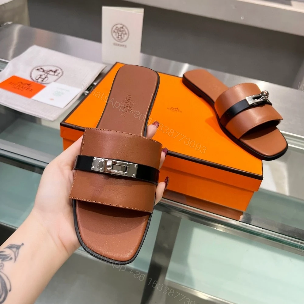 View 5 of HERMES GIULIA SANDAL GOLD AND NOIR H231056Z 20360