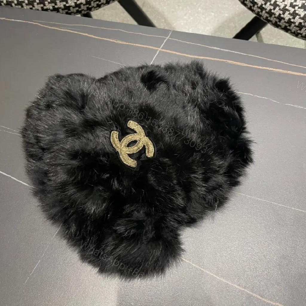 View 3 of Lux Fur-Trim Pom-Pom Bag Charm: Gold Emblem Accent