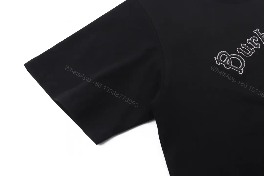 View 3 of Black Cotton Logo Tee: Subtle Crest, Everyday Luxe Top