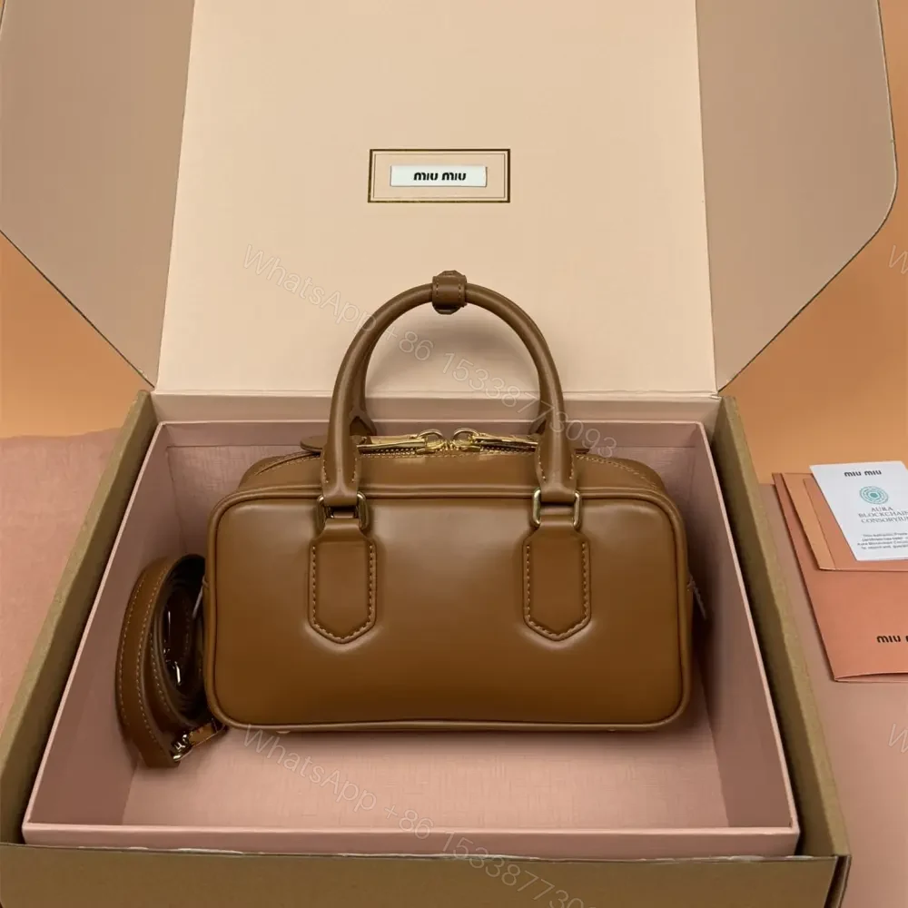 View 2 of 高仿miumiu*Arcadie系列5BB142小牛皮斜挎包干邑色免檢版