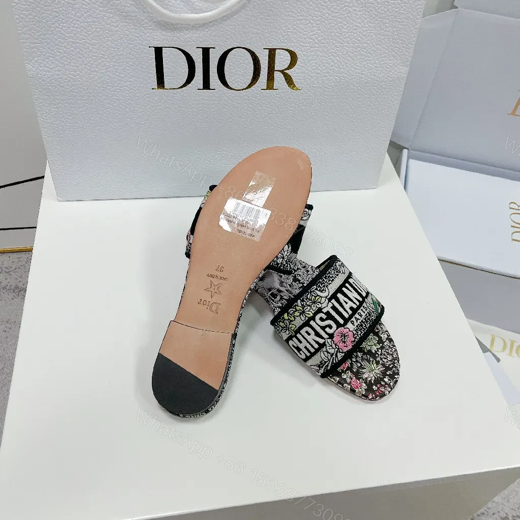 View 3 of Floral-Print Slides in Black with Signature Dior Strap