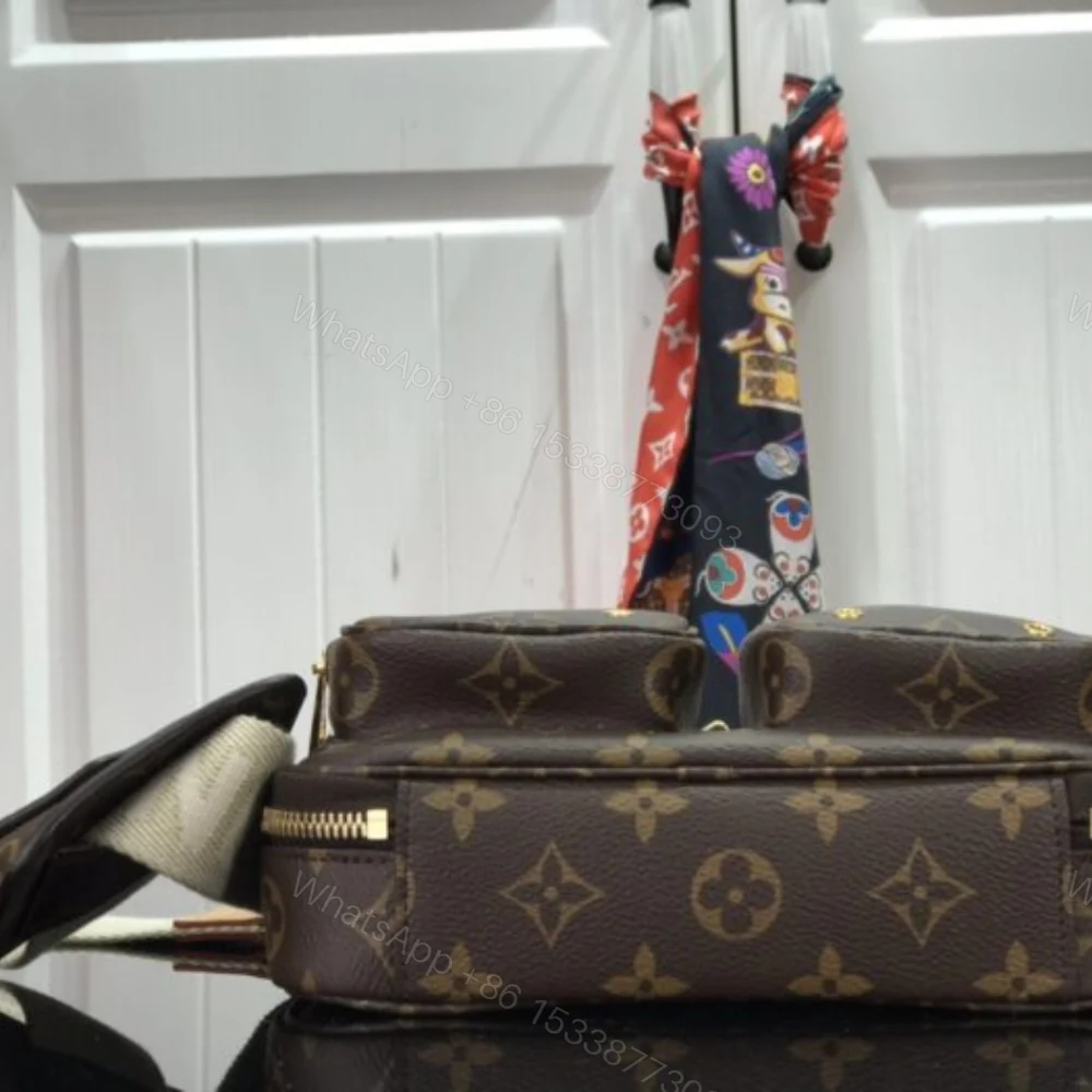 View 4 of Louis Vuitton Utility Crossbody Bag Brown 18Cm M80446