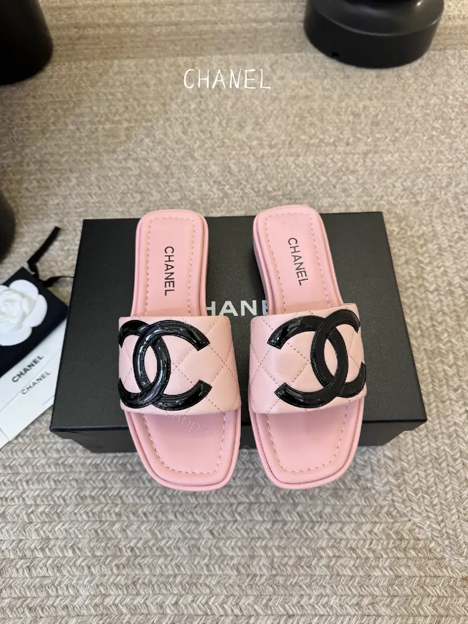 View 3 of Pastel Pink Faux-Leather Slides with Logo Hardware