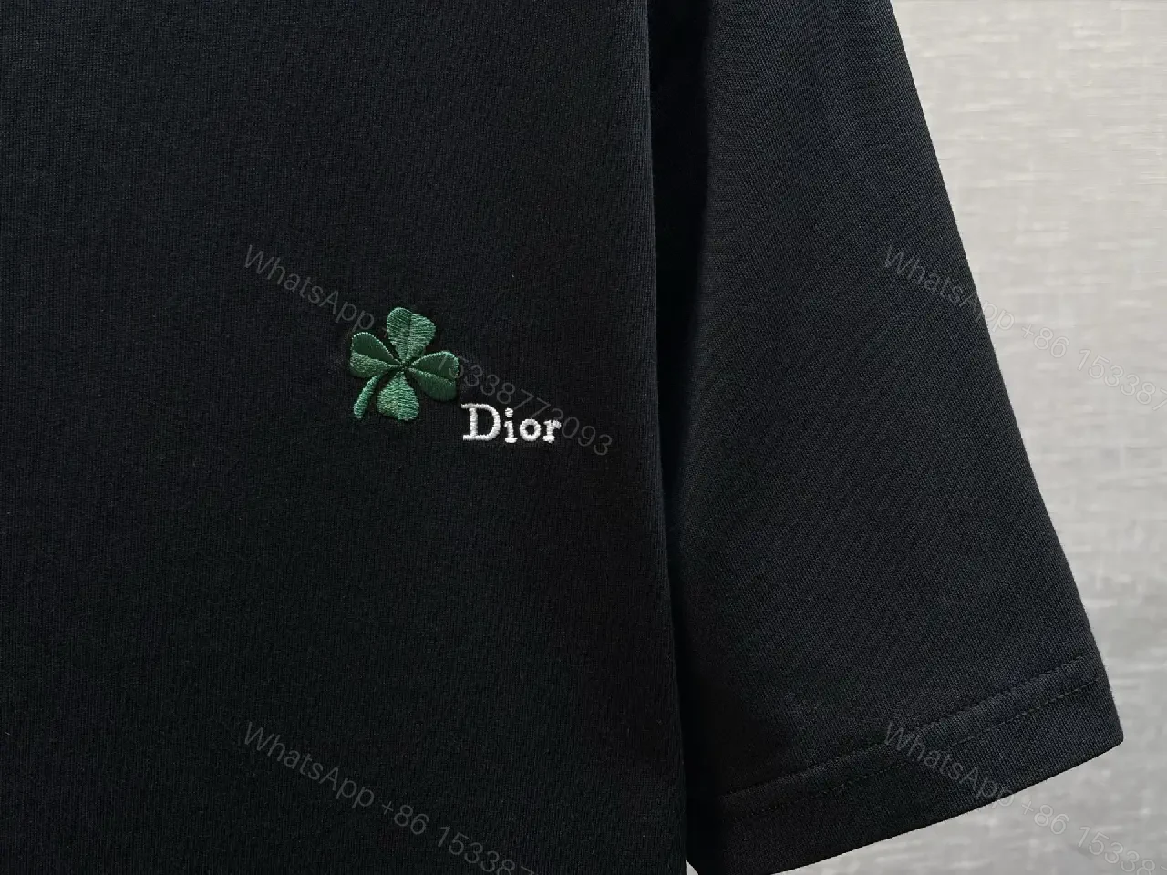 View 2 of Black Cotton T-Shirt with Green Clover Embroidery, Dior-inspired Style, Logo Feature, T-Shirt