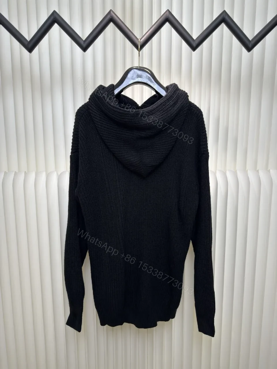 View 4 of Chunky Knit Hoodie in Deep Black with Subtle Logo Embossing, Modern Luxe