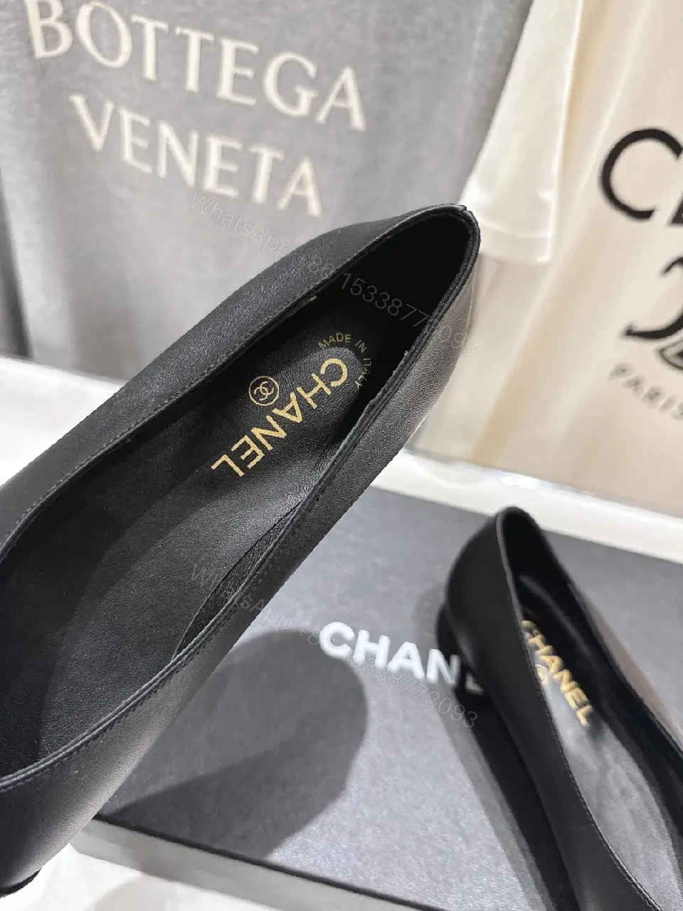 View 5 of Chic Black Leather Slip-Ons with Quilted Toe Comfort Flats