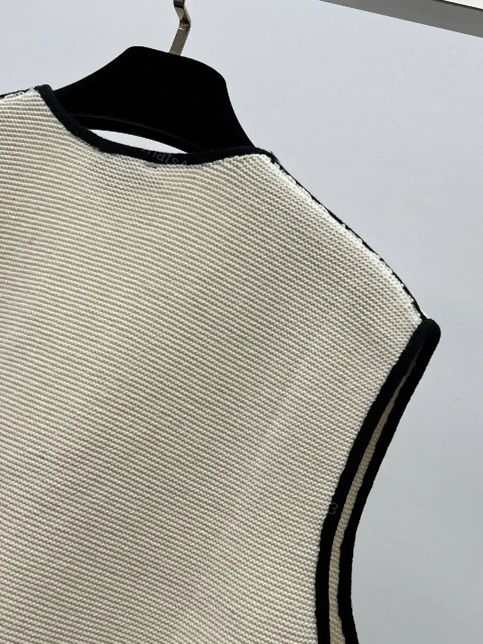 View 3 of Beige Knit Vest Black Trim V-Neck Chanel Logo Patch Tank Vest