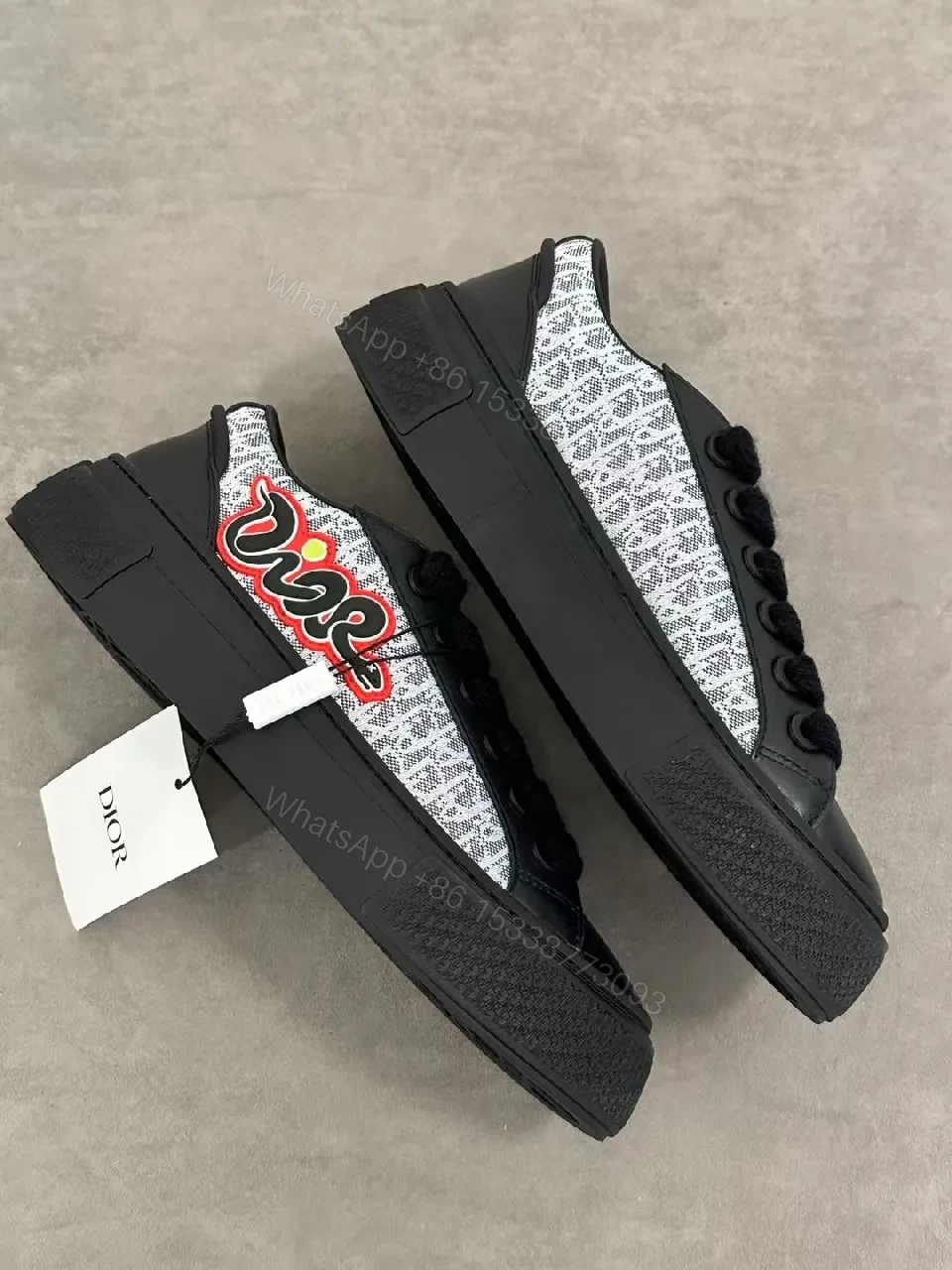 View 7 of Bold Leather High-Top Sneakers with Red Script Graphic