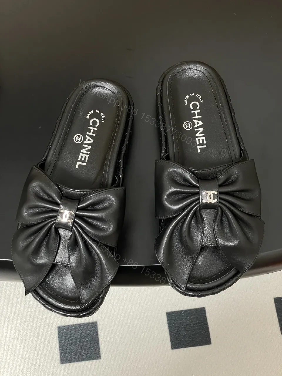 View 7 of Chic Black Quilted Slides with Bow Detail - Luxury Casual Platform