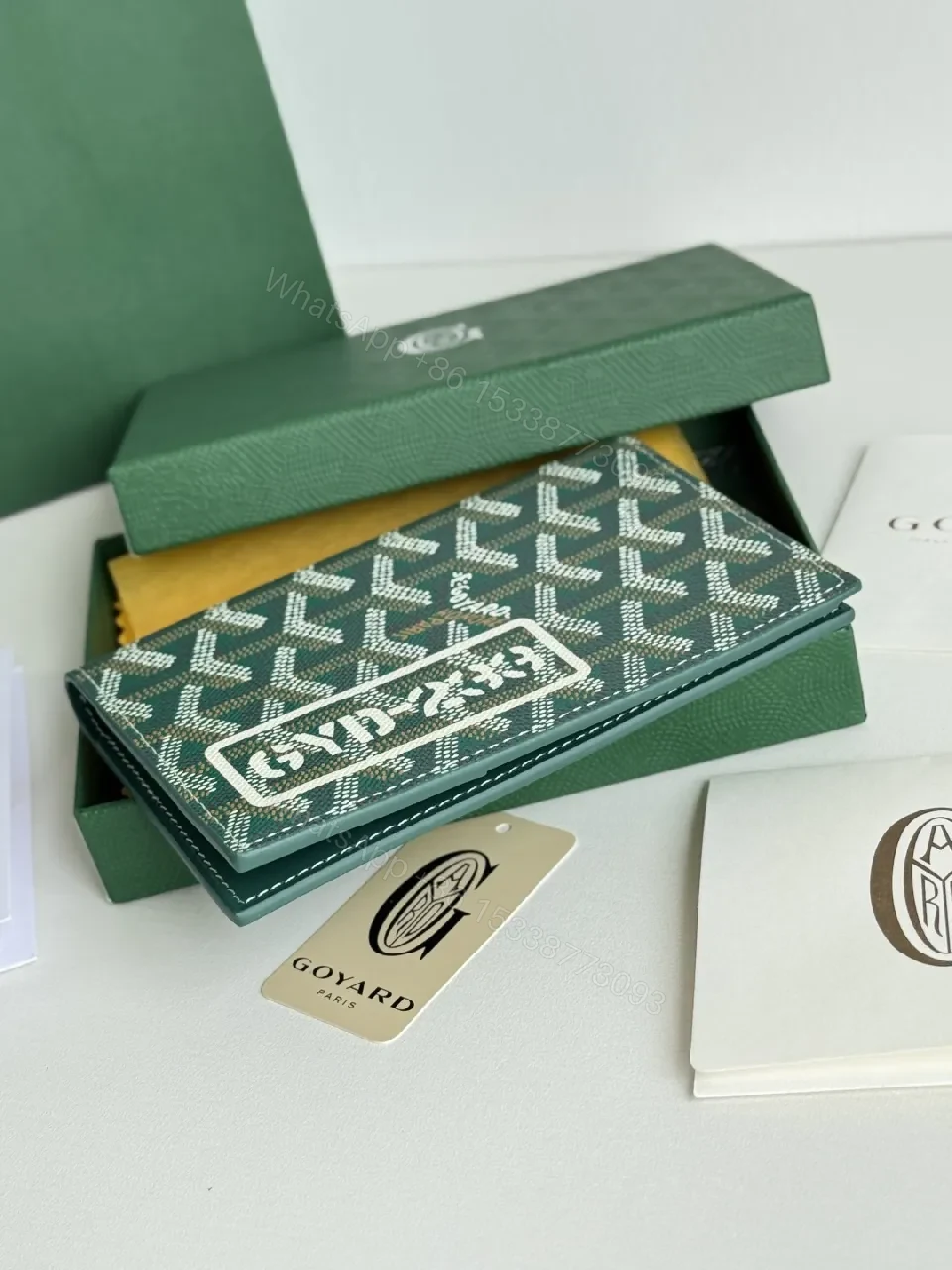 View 2 of Green Canvas Compact Wallet – Signature Pattern, Bi-Fold Luxury