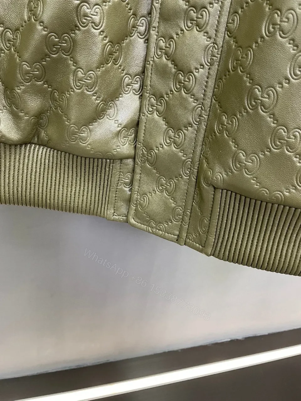 View 2 of Olive Quilted Jacket with Off-White Shearling Collar